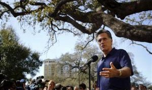 Republican presidential candidate and former Massachusetts Governor Mitt Romney answers questions from reporters outside his campaign offices in Tampa