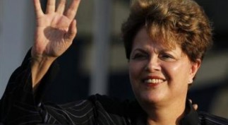 Brazil's President Dilma Rousseff waves during an official visit to Cuba after arriving at Havana's Jose Marti airport