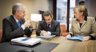 Germany's Chancellor Merkel meets with France's President Sarkozy and Italy's Prime Minister Monti shortly before an informal meeting of the European Council ahead of the European Union leaders summit in Brussels