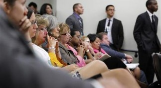 Attendees of a White House Community Leaders Briefing on Seniors Issues listen to remarks by Biden at the Eisenhower Executive Office Building in Washington