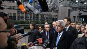 Italy's Prime Minister Mario Monti arrives at the EU council headquarters for an European Union leaders summit discussing the European Union's long-term budget in Brussels