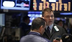 Traders work on the floor of the New York Stock Exchange