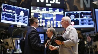 Traders work on the main trading floor of the New York Stock Exchange shortly after the opening bell in New York in this file photo