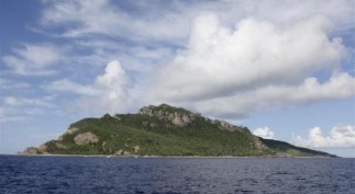 A group of disputed islands known as Senkaku in Japan and Diaoyu in China is seen from the city government of Tokyo's survey vessel in the East China Sea