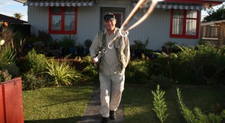 Fishing rod in hand, Harvey leaves his home for an assignment